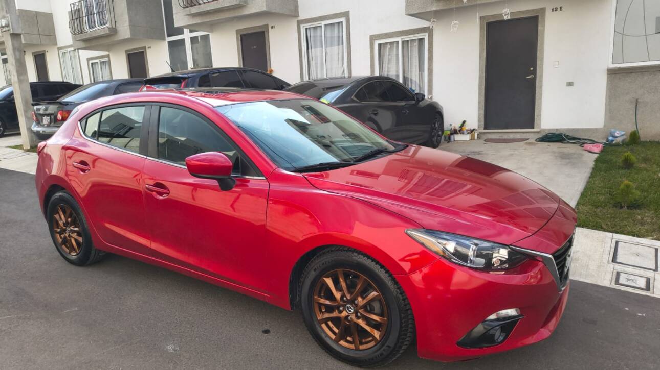 MAZDA 3 GRAND  TORING 2016 ROJO CANDY
